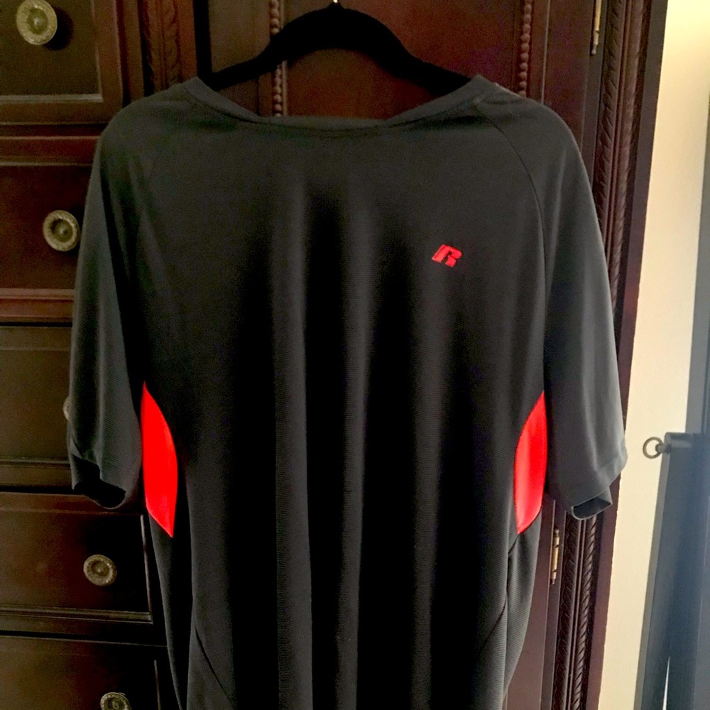 Dry fit sport shirt black w/orange, white and silver accents double X.
